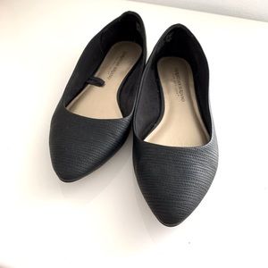 Black flats by Christian Siriano